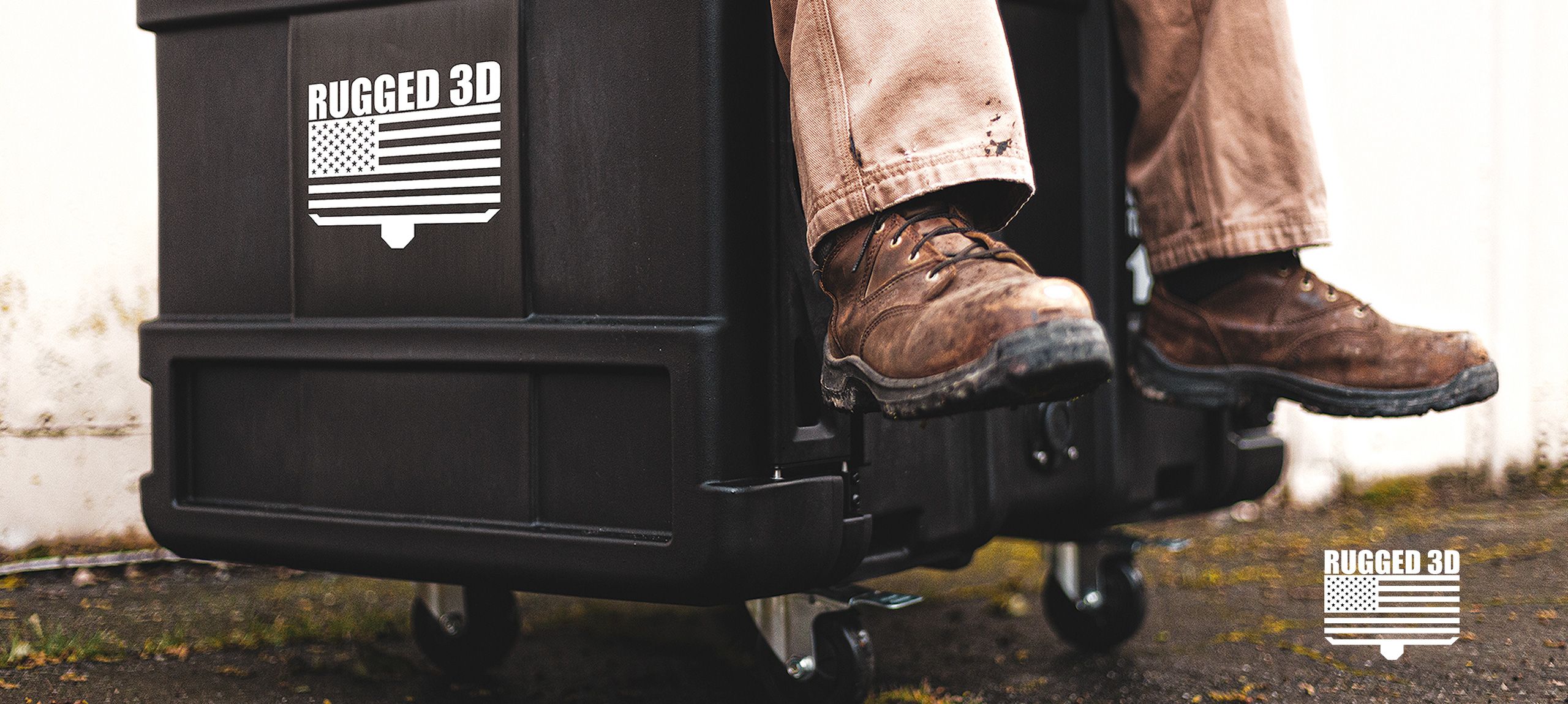 Rugged_3D box, man sitting on top with boots